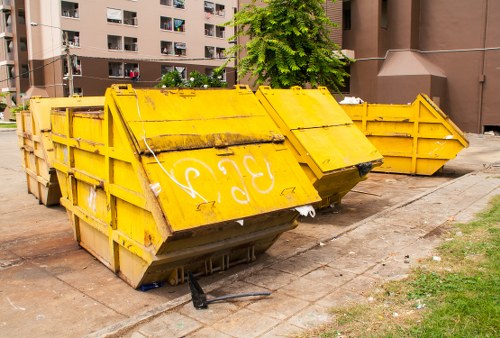 Residents utilizing waste recycling services in Gipsy Hill