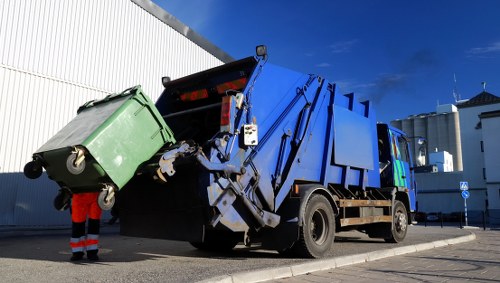 Demolition site with waste removal equipment in Gipsy Hill