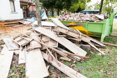 Professional house clearance team working in a Gipsy Hill home