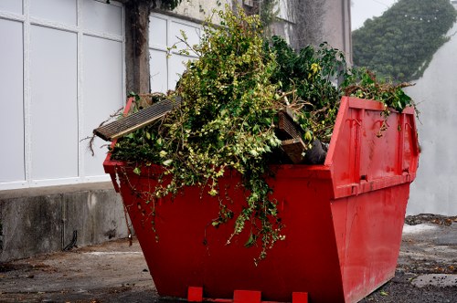 Process of loading waste into a skip